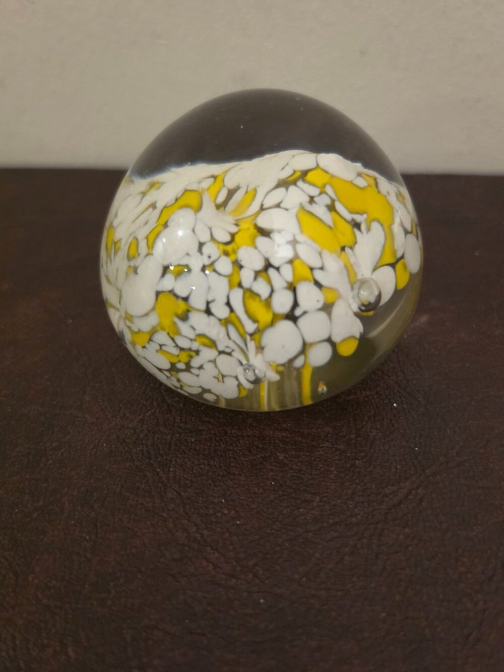 Vintage yellow/white flower paperweight is hand-blown from glass with a floral